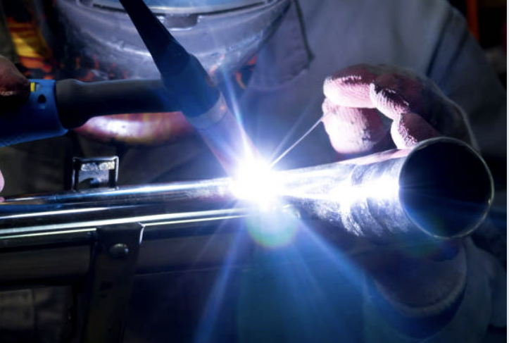 TIG welder at work